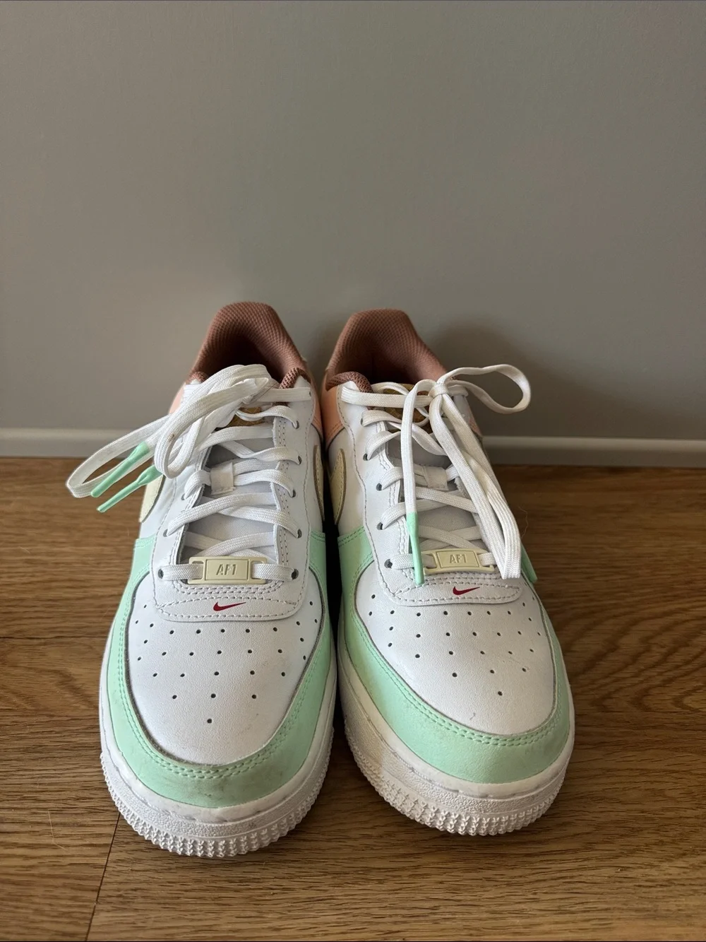 Nike White Sneakers with Mint Green & Peach Accents